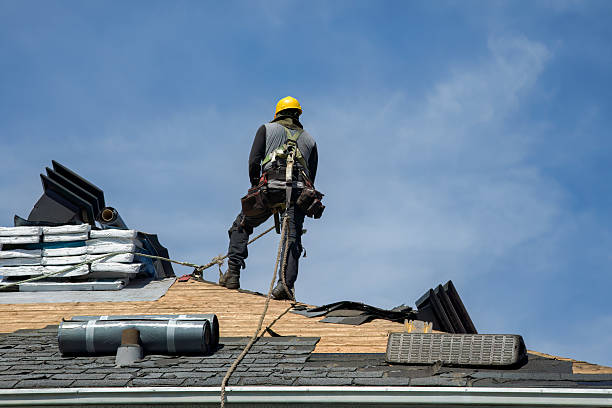 Professional Roofing technician working in Port Jefferson, NY